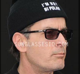 Charlie Sheen wears a Persol PO2965 eyeglasses frame fitted with tinted glasses.