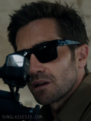 Jake Gyllenhaal wears Prada PR 19WS sunglasses in the movie In The Grey.
