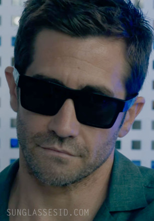 Jake Gyllenhaal wears black Prada PR 19WS sunglasses in In The Grey.