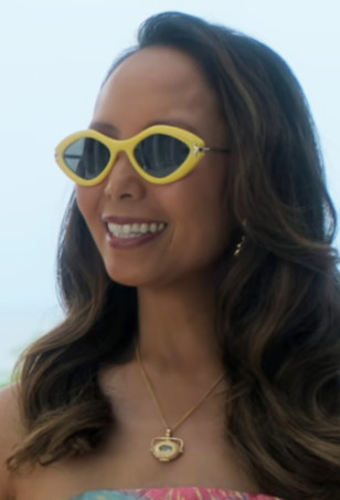 Emily Borromeo wears Pucci Geometric Shiny Yellow sunglasses in Sirens.