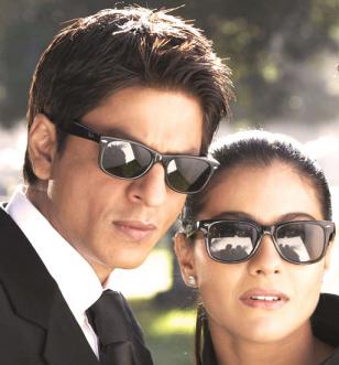 Shahrukh Khan and Kajol wear black Ray-Ban 2140 Wayfarer sunglasses on the set o