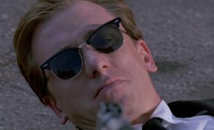 Tim Roth wearing Ray-Ban 3016 Clubmaster sunglasses
