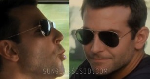 Bradley Cooper wears Ray-Ban Aviator sunglasses in Aloha.