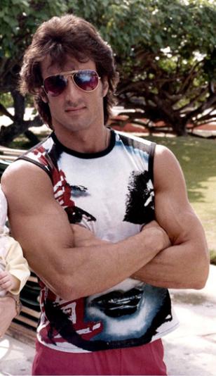 Sylvester Stallone with Ray-Ban 3030 or 3029 Outdoorsman sunglasses in 1983