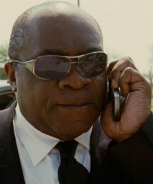 Yaphet Kotto wearing Ray-Ban 3320 sunglasses