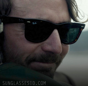 Tom Basden wears a pair of Ray-Ban 2140 Wayfarer in The Ballad of Wallis Island.