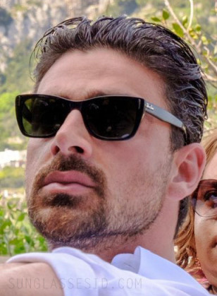 Michele Morrone wears Ray-Ban RB2248 Caribbean sunglasses in the film Another Simple Favor.
