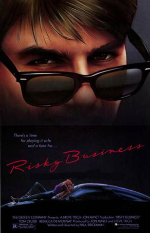 Tom Cruise wearing Ray-Ban Wayfarer sunglasses on the Risky Business movie poster
