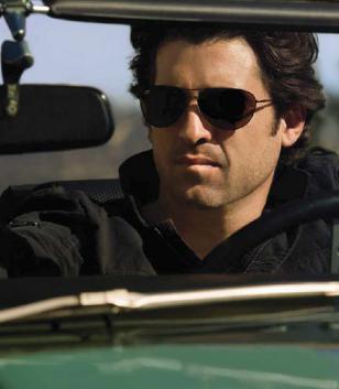 Patrick Dempsey wearing Serengeti Napoli on a promotional photo