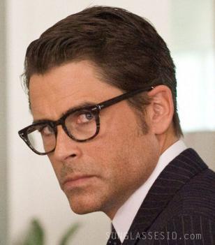 Rob Lowe wearing Shuron Freeway eyeglasses on a movie wallpaper