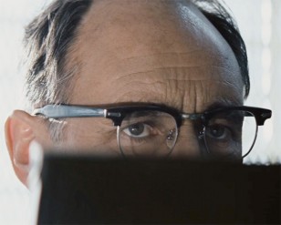 In Bridge of Spies, actor Mark Rylance wears a pair of Shuron Ronsir Zyl Black Briar Taper Temple eyeglasses.