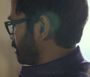 Actor Dhanush wears a pair of Emporio Armani EA3019 eyeglasses in The Gray Man.