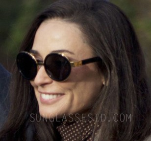 Demi Moore wears a pair of RetroSuperFuture Santa Black and gold sunglasses in the movie Blind.