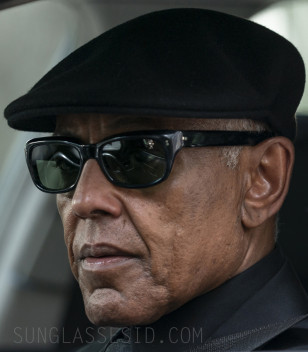 Giancarlo Esposito wears black wayfarer style sunglasses in Parish.