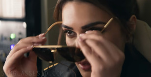 Kriti Sanon as Junior Flight Attendant Divya Bajwa wears Bottega Veneta BV1194S sunglasses in the movie Crew.