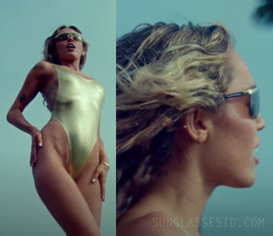 Miley Cyrus wears Chanel 9555 Shield sunglasses in the video for Jaded.