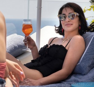 Simona Tabasco wears a pair of Dolce & Gabbana DG4346 sunglasses in the second season of The White Lotus.