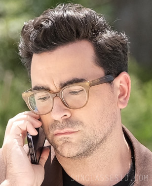 Dan Levy wears a pair of brown eyeglasses in the HBO series The Idol (2023).