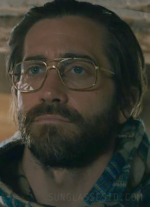 Jake Gyllenhaal wears vintage metal frame eyeglasses in the 2023 Guy Ritchie film The Covenant.