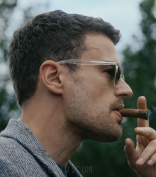 Theo James wears Garrett Leight Hampton sunglasses with a transparent frame in the series The Gentlemen.