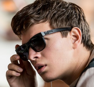 Ansel Elgort wears black ic! berlin Fahrlehrer Klaus sunglasses in Baby Driver.