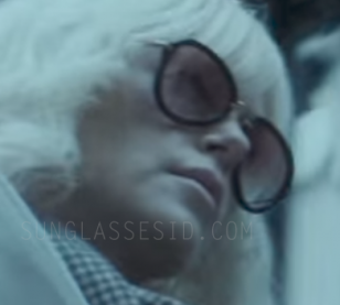 Charlize Theron with the Miu Miu 03QS sunglasses in Atomic Blonde.