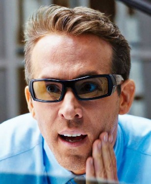 Ryan Reynolds wears black modified Oakley Gascan sunglasses in the movie Free Guy.