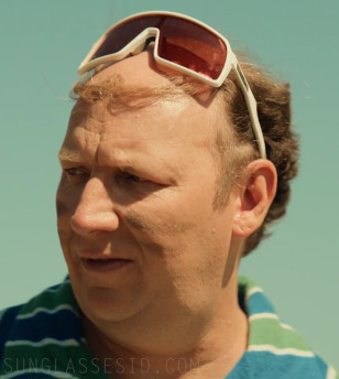 Dan Bakkedahl wears Oakley Sutro sunglasses in the 2023 movie Buddy Games: Spring Awakening.