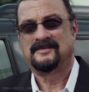 Steven Seagal wears Oakley Whisker sunglasses in General Commander