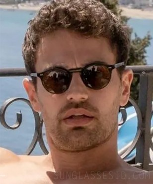 Theo James wears Oliver Peoples Gregory Peck 1962 Folding sunglasses in The White Lotus.
