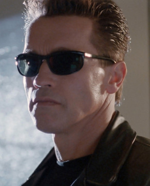 Arnold Schwarzenegger wears a pair of Persol Ratti 58230 sunglasses in Terminator 2: Judgement Day. In this photo you can see the Meflecto system in action (the vertical lines on the arms of the sunglasses that make it more flexible)