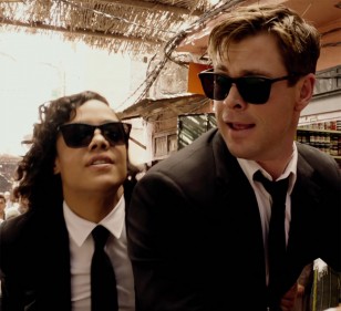 Tessa Thompson and Chris Hemsworth wear Police Origins 1 SPL872 sunglasses in the movie Men In Black: International.