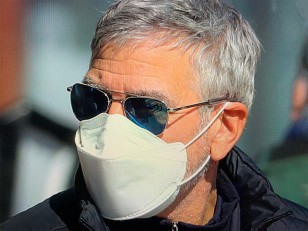 George Clooney wears Randolph Engineering Aviator sunglasses on the set of his new movie The Tender Bar.