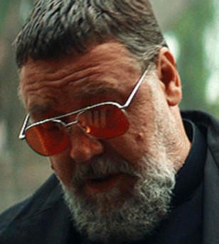 Russell Crowe wears red lens sunglasses in The Pope's Exorcist.