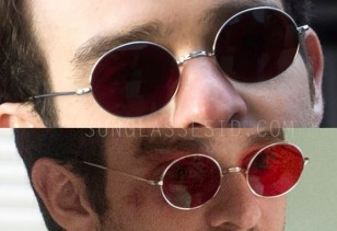 Charlie Cox as Matt Murdock / Daredevil wears a pair of custom round sunglasses with red lenses in Daredevil.