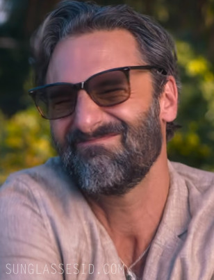 Marco Calvani wears rectangle tortoise frame sunglasses in The Four Seasons.