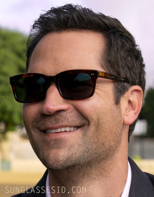 Manuel Garcia-Rulfo wears tortoise shell, rectangle sunglasses in Episode 3 of Season 2 of The Lincoln Lawyer.