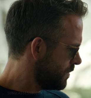 The sunglasses are worn by Ryan Reynolds at the end of the film 6 Underground