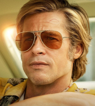 Brad Pitt wears vintage gold aviator sunglasses in Once Upon A Time In Hollywood (2019).